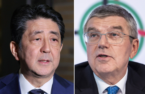 아베 신조 일본 총리(왼쪽)와 토마스 바흐 국제올림픽위원회(IOC) 위원장이 전화 회담을 통해 도쿄올림픽을 1년 가량 연기하는데 전격 합의 했다. 사진= 연합뉴스.