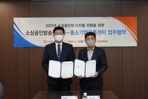 정진수 중소기업유통센터 대표이사(왼쪽)와 신동욱 소상공인방송정보원장. 사진=중소기업유통센터 제공